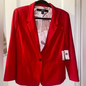 Red blazer. Never worn. Size large. Excellent condition